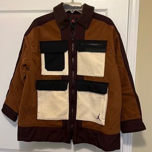 NIKE JUMP-MAN WOMENS MILTI COLORED OVERSIZED COAT.  MULTI COLORED NWT